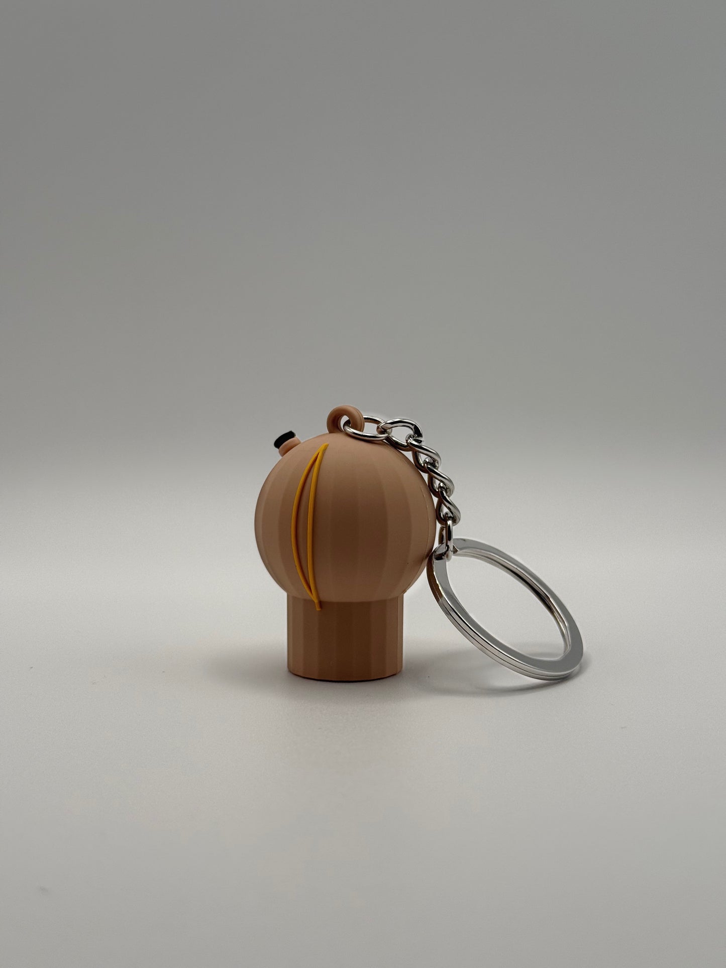 16" Display shell Keychain + Free Stickers